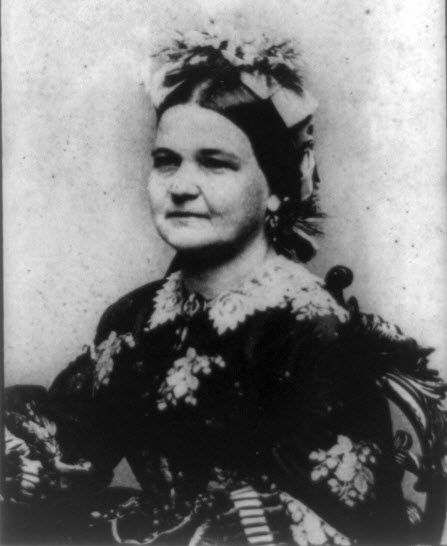 picture of Mary Todd Lincoln. A younger Mary Todd Lincoln wearing an interesting flower pattern dress.