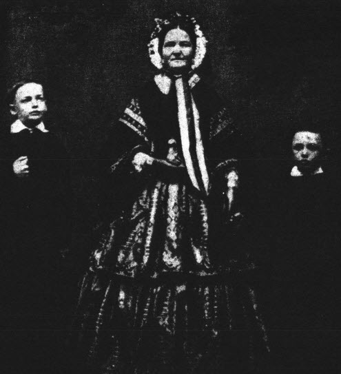 picture of Mary Todd Lincoln. Mrs. Lincoln flanked by two of her children.